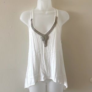 White sleeveless top